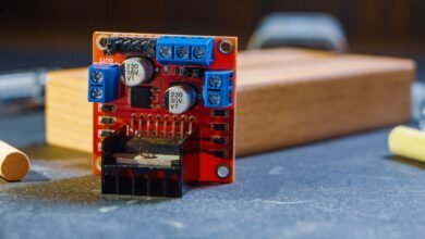 close up of electronic circuit board on table