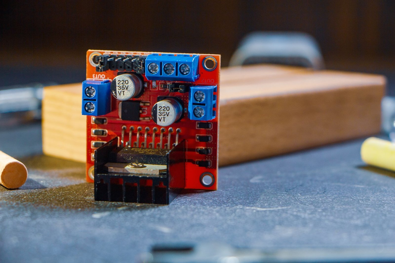 close up of electronic circuit board on table