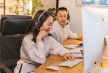 woman and man wearing headphones