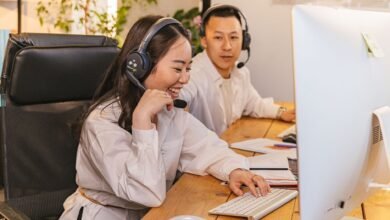woman and man wearing headphones