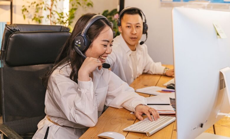 woman and man wearing headphones